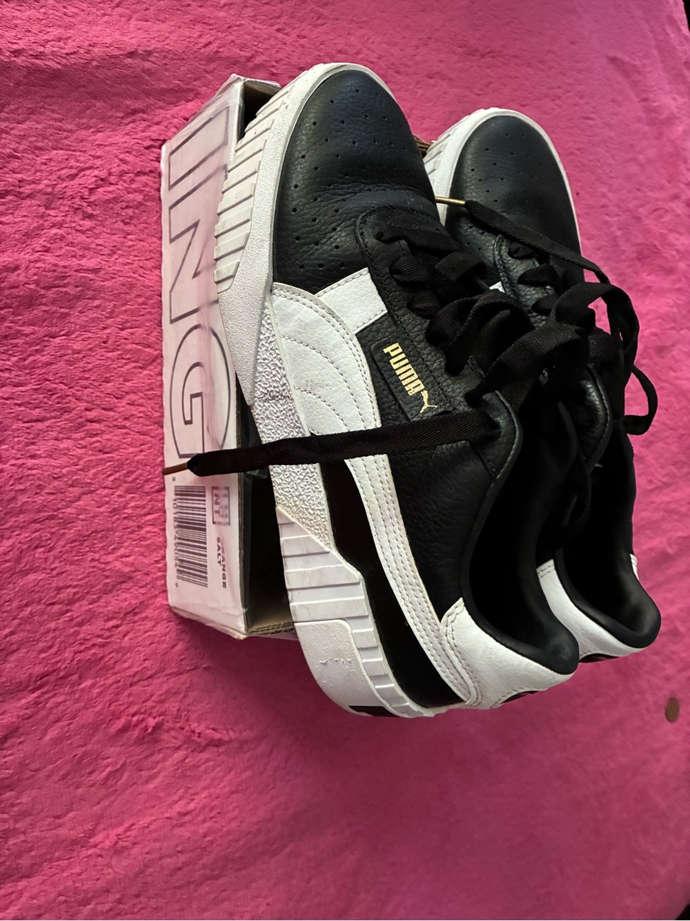 Puma Women's Black and White Platform Sneakers with Gold Logo